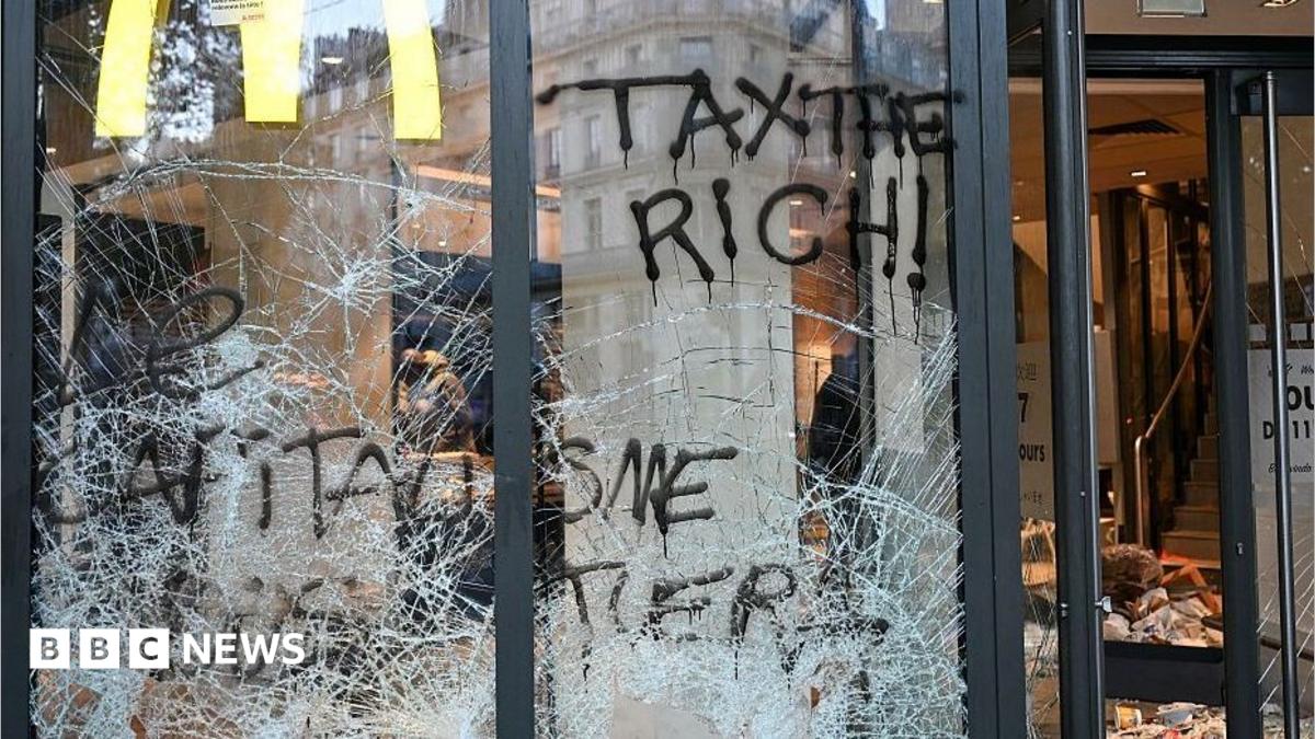 Burnt Cars and Shattered Glass Across Paris as Protests Turn to Riots and Looting